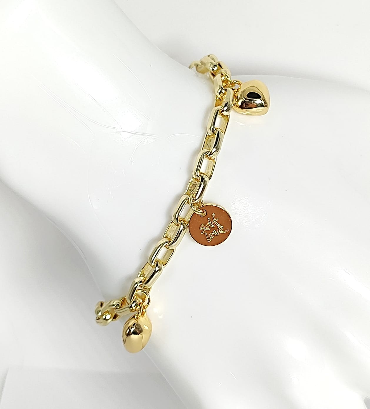 MANILLA DE AROS CON DIJES DE CORAZON