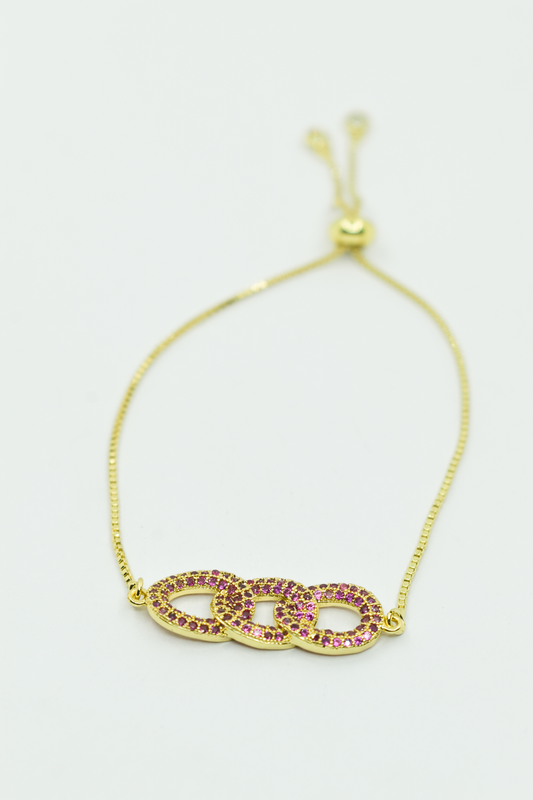 MANILLA DORADA CIRCULOS ROSADOS